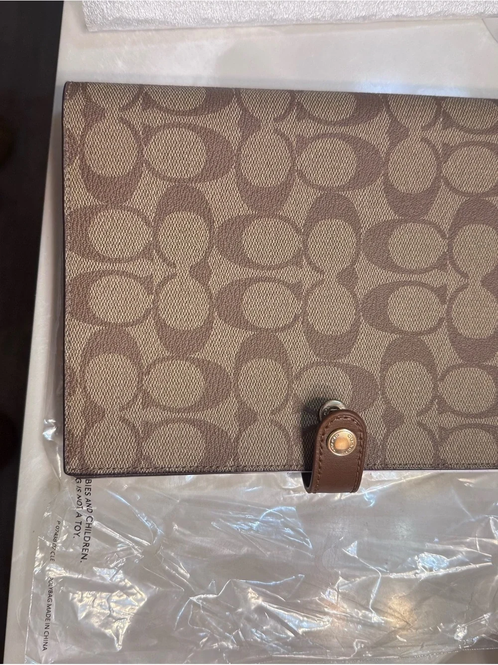 Coach Silver Tablet Sleeve with Snap Closure